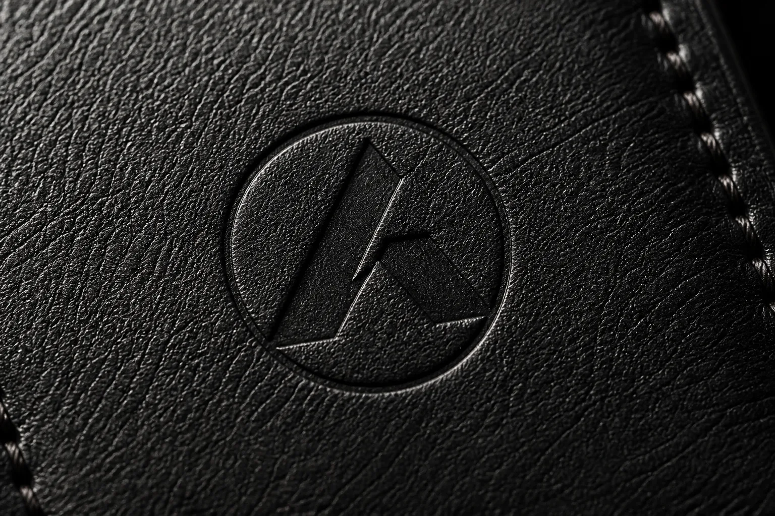 The circular A blind-embossed in calf